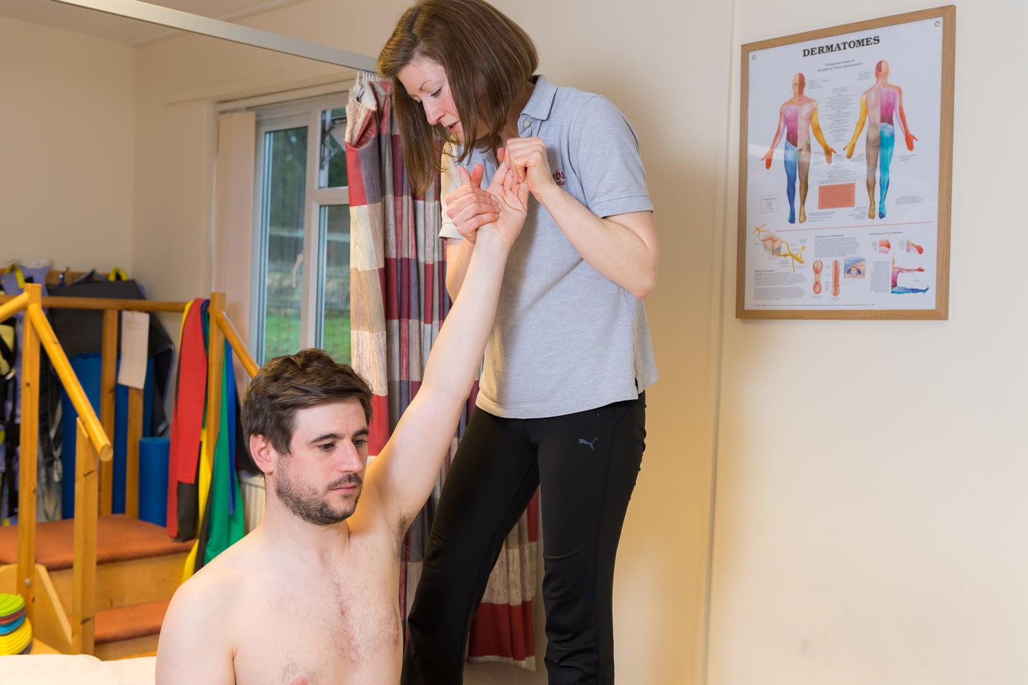 patient receiving hands-on physiotherapy as part of their intensive rehabilitation package